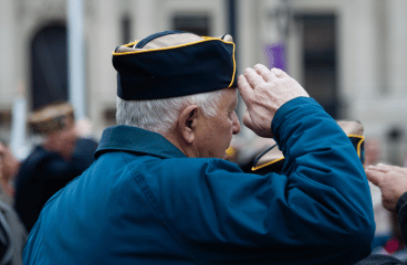Image of a Veteran on Veterans' Day saluting